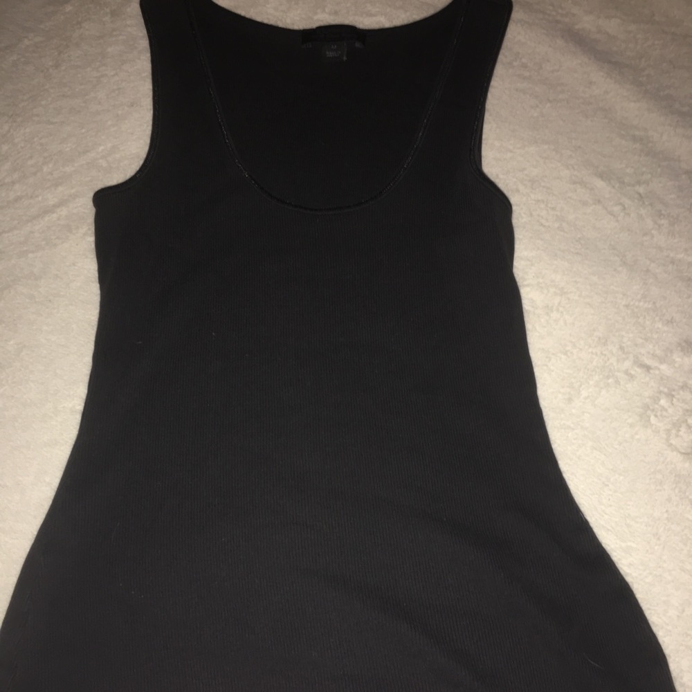 Ribbed tank top with red sequins at bottom